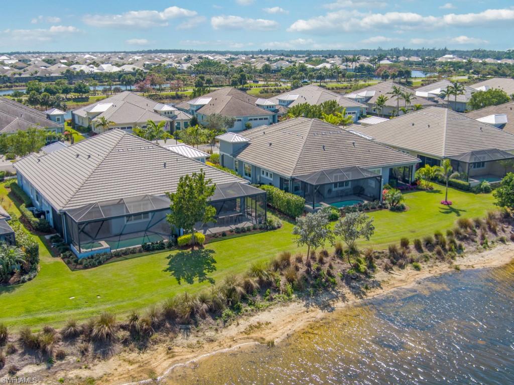 5697 Highbourne Drive Naples, FL 34113 - Photo 28 of 35 an aerial view of a house with a garden