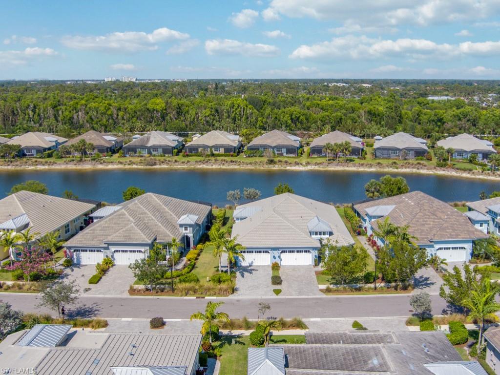 5697 Highbourne Drive Naples, FL 34113 - Photo 29 of 35 a view of a lake with a ocean view