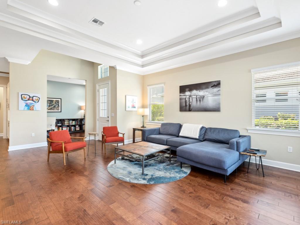 5697 Highbourne Drive Naples, FL 34113 - Photo 8 of 35 a living room with furniture and a window