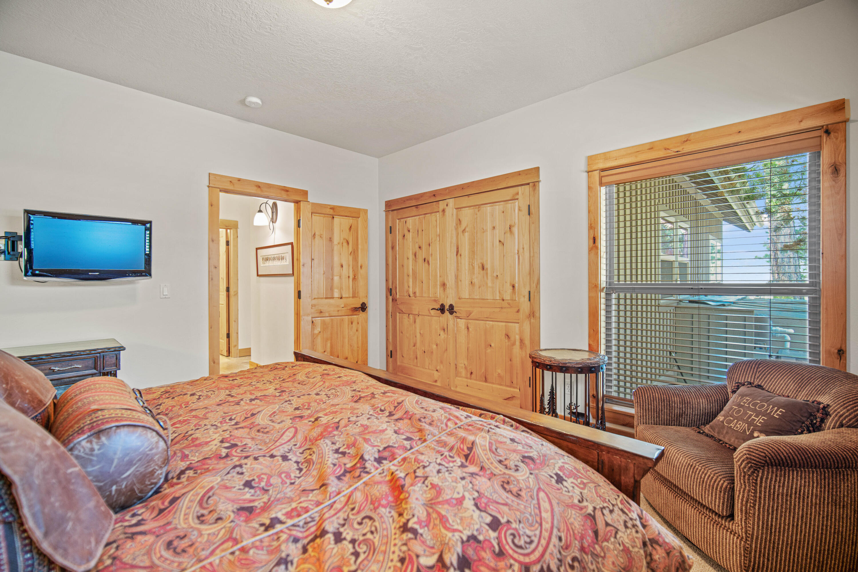 56689 Dancing Rock Loop Bend, OR 97707 - Photo 28 of 51 a bedroom with a bed and a couch