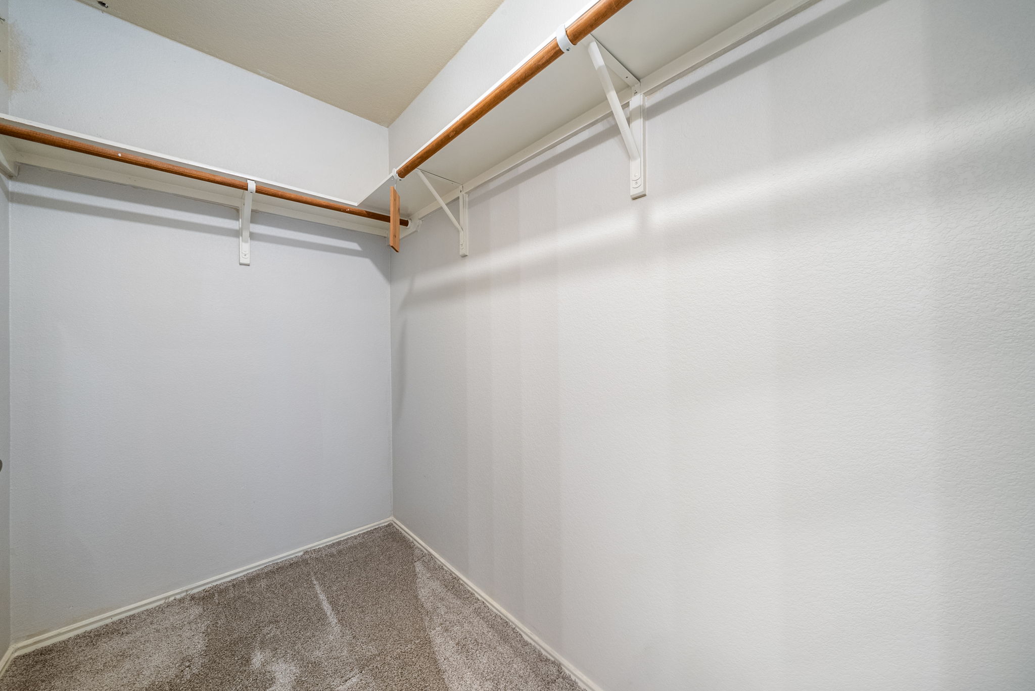 7124 Outfitter Drive Austin, TX 78744 - Photo 21 of 25 a view of walk in closet