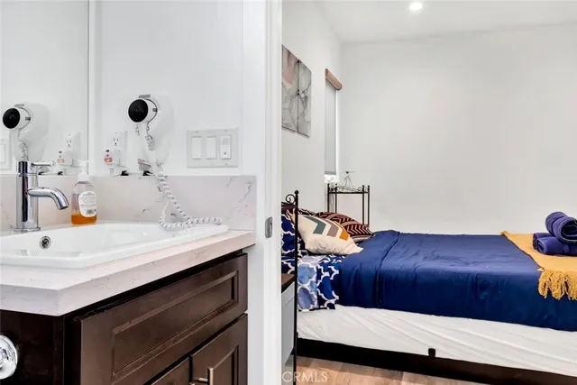 a view of bathroom with dual sinks