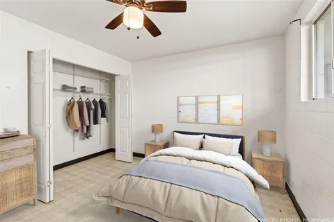 a bedroom with a bed and window