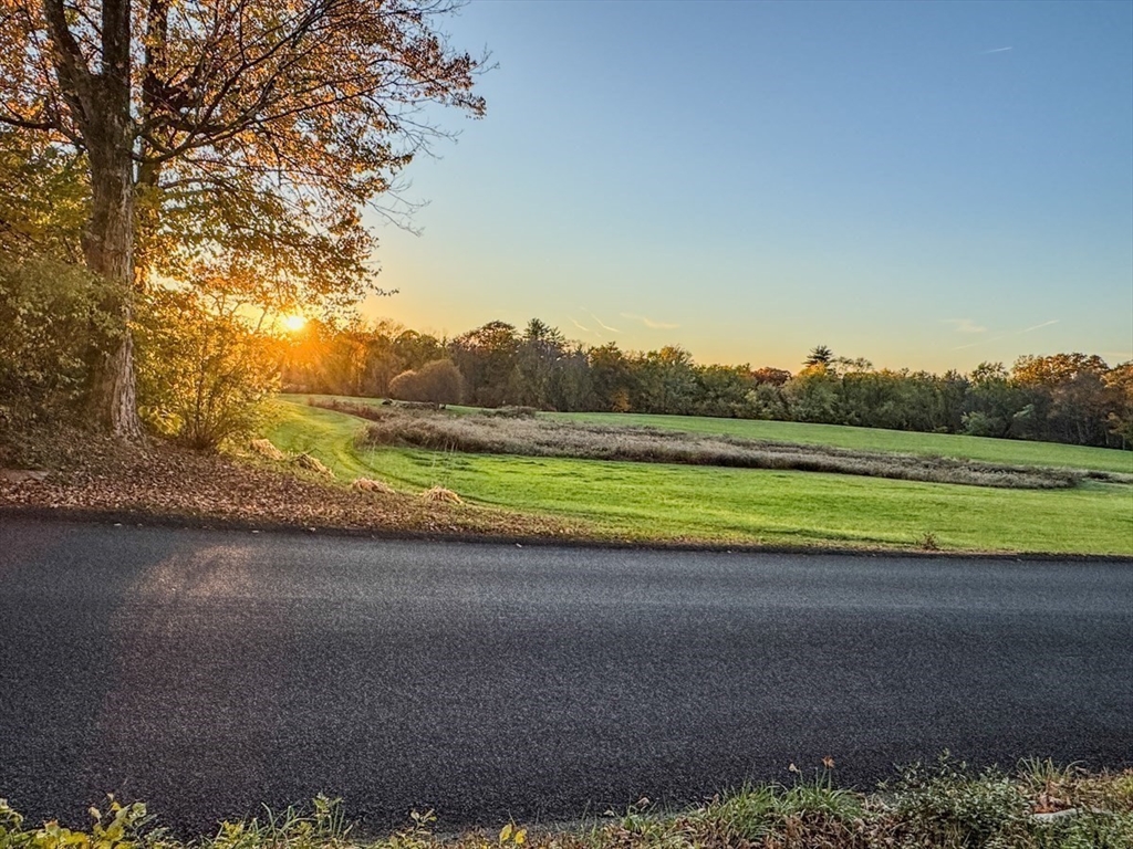 90 South Mountain Road Northfield, MA 01360 - Photo 21 of 22 a view of a golf course with a lake
