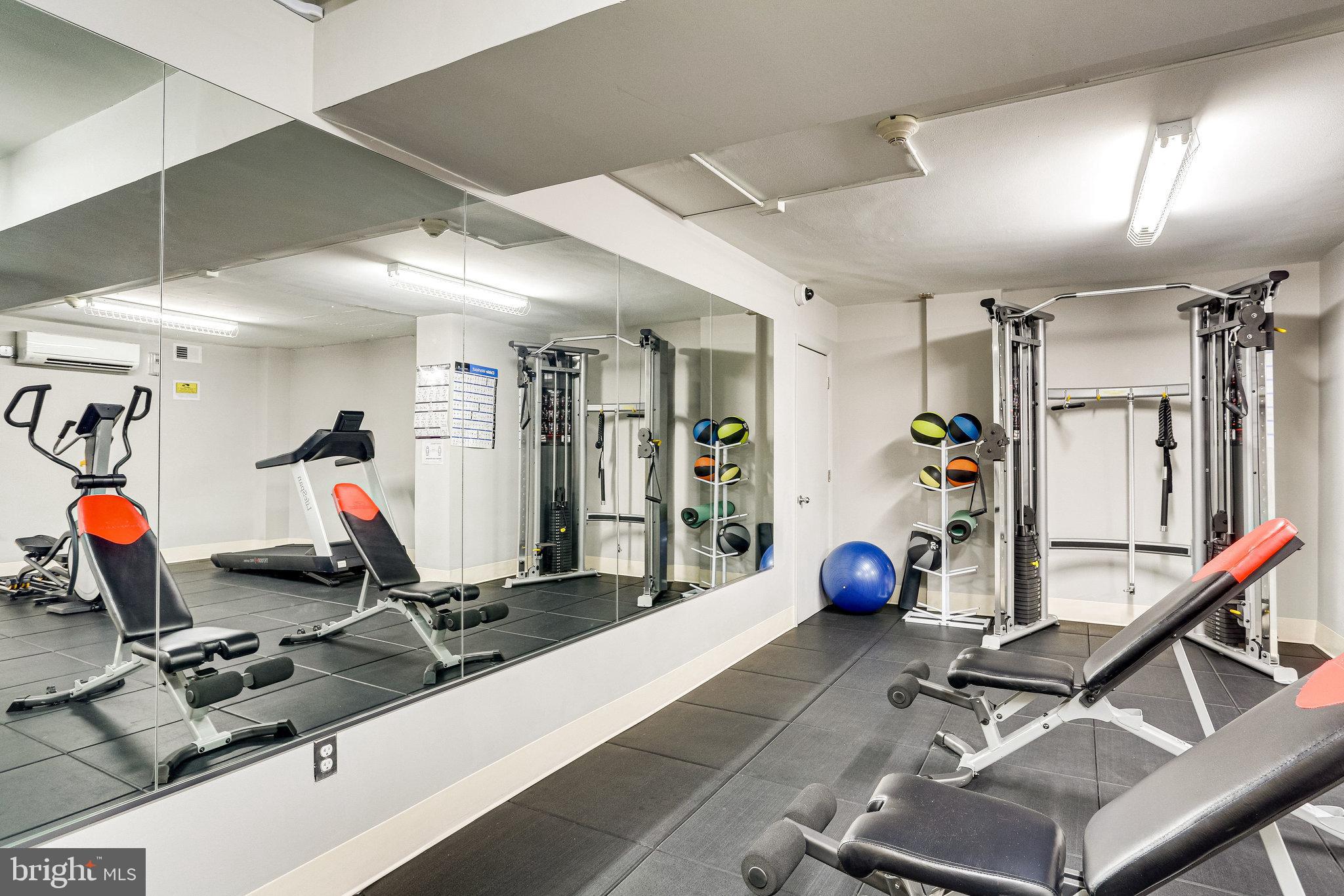 4000 Tunlaw Road Northwest, Unit 1030 Washington, DC 20007 - Photo 13 of 19 a view of a room with gym equipment