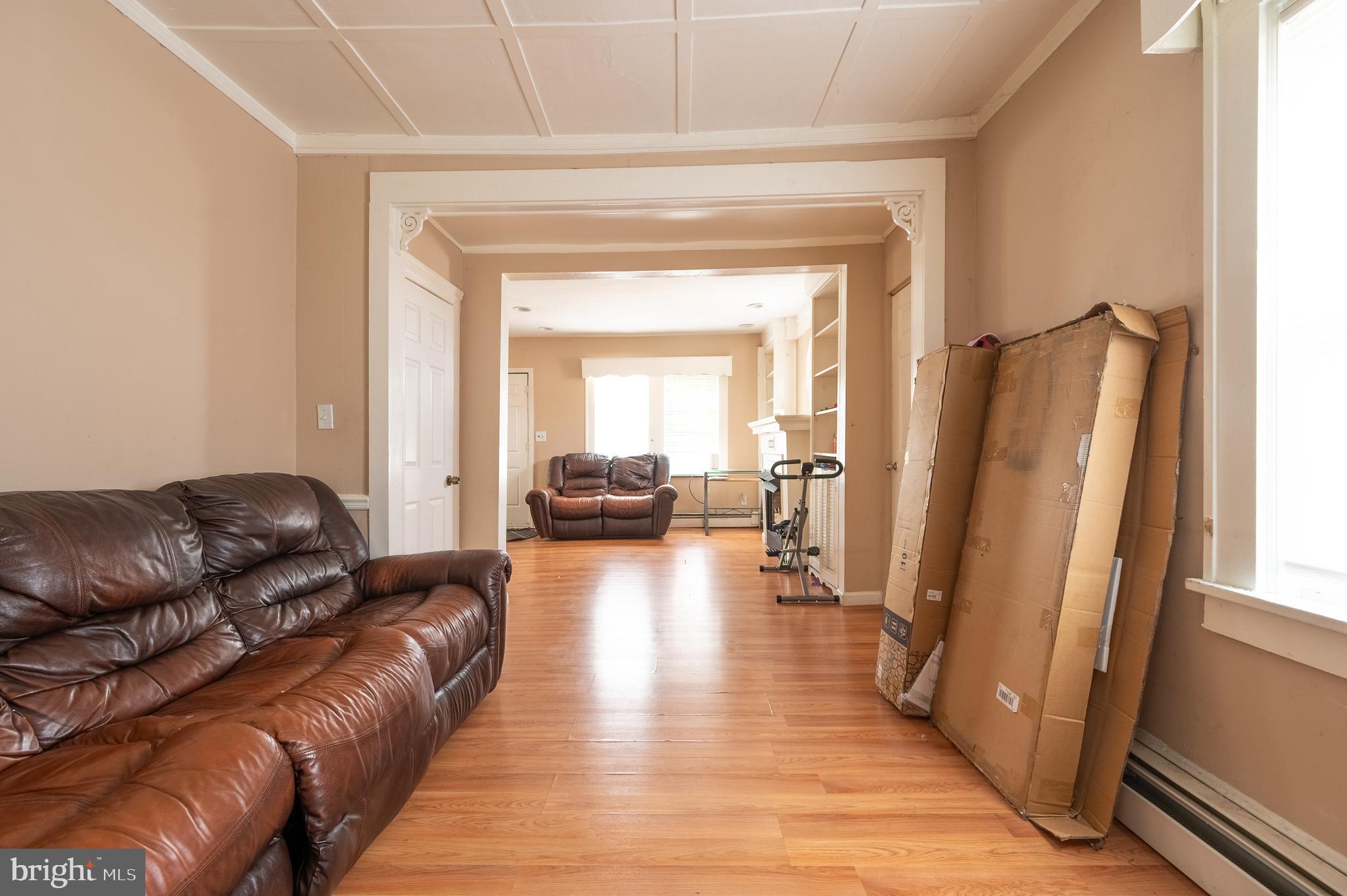 706 Augustine Road Atlantic City, NJ 08401 - Photo 11 of 29 a living room with furniture and a to a window