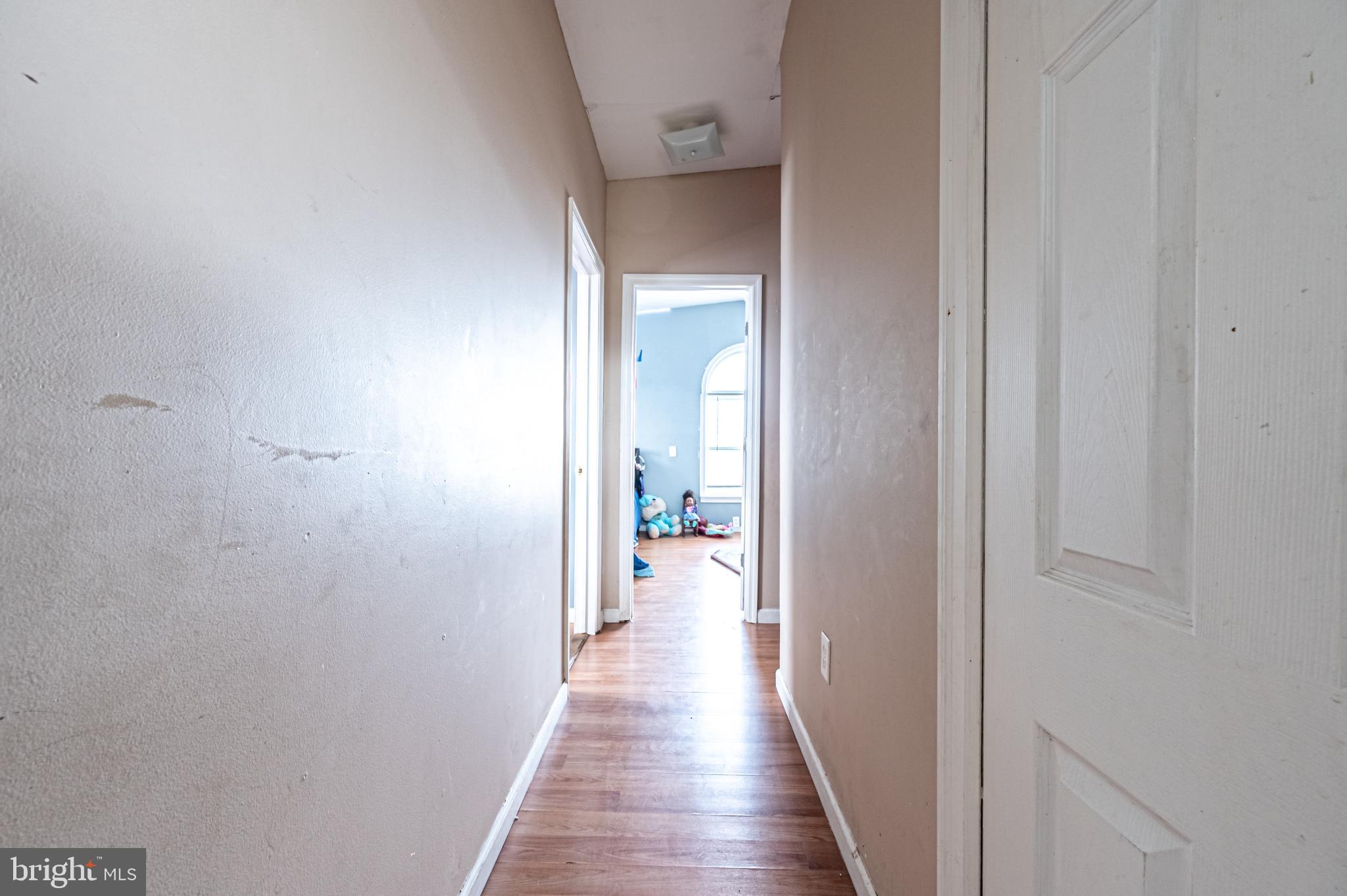 706 Augustine Road Atlantic City, NJ 08401 - Photo 21 of 29 a view of a hallway with wooden floor