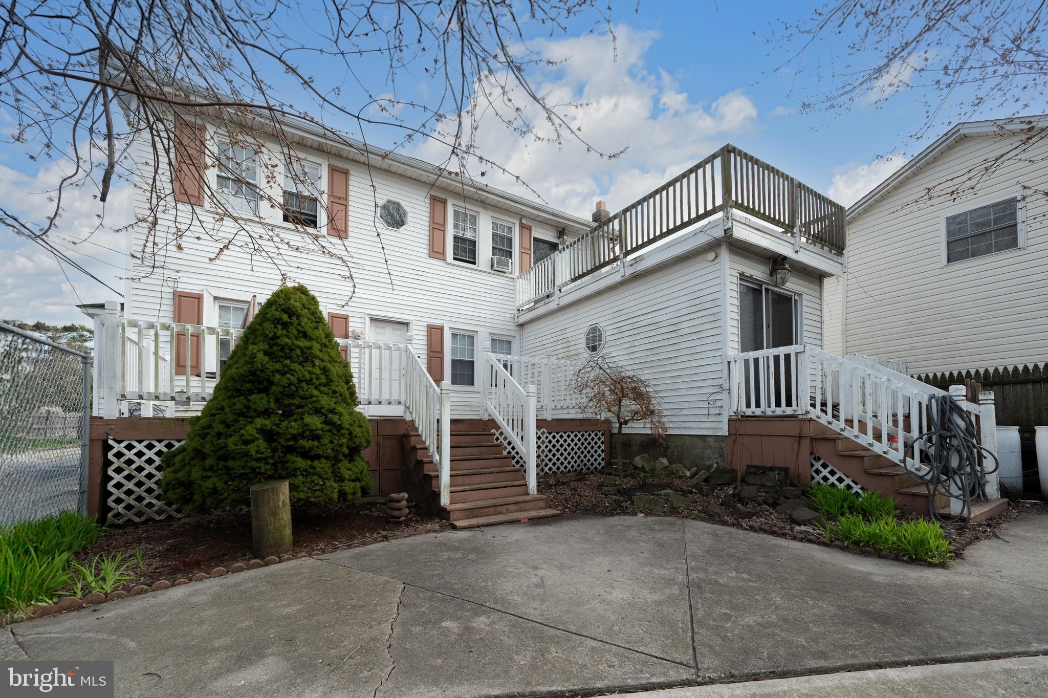 706 Augustine Road Atlantic City, NJ 08401 - Photo 3 of 29 a view of a house with a yard