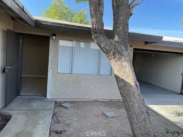 a house view with a wooden door