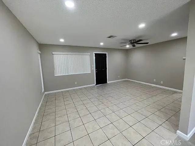 a bathroom with a sink toilet and window