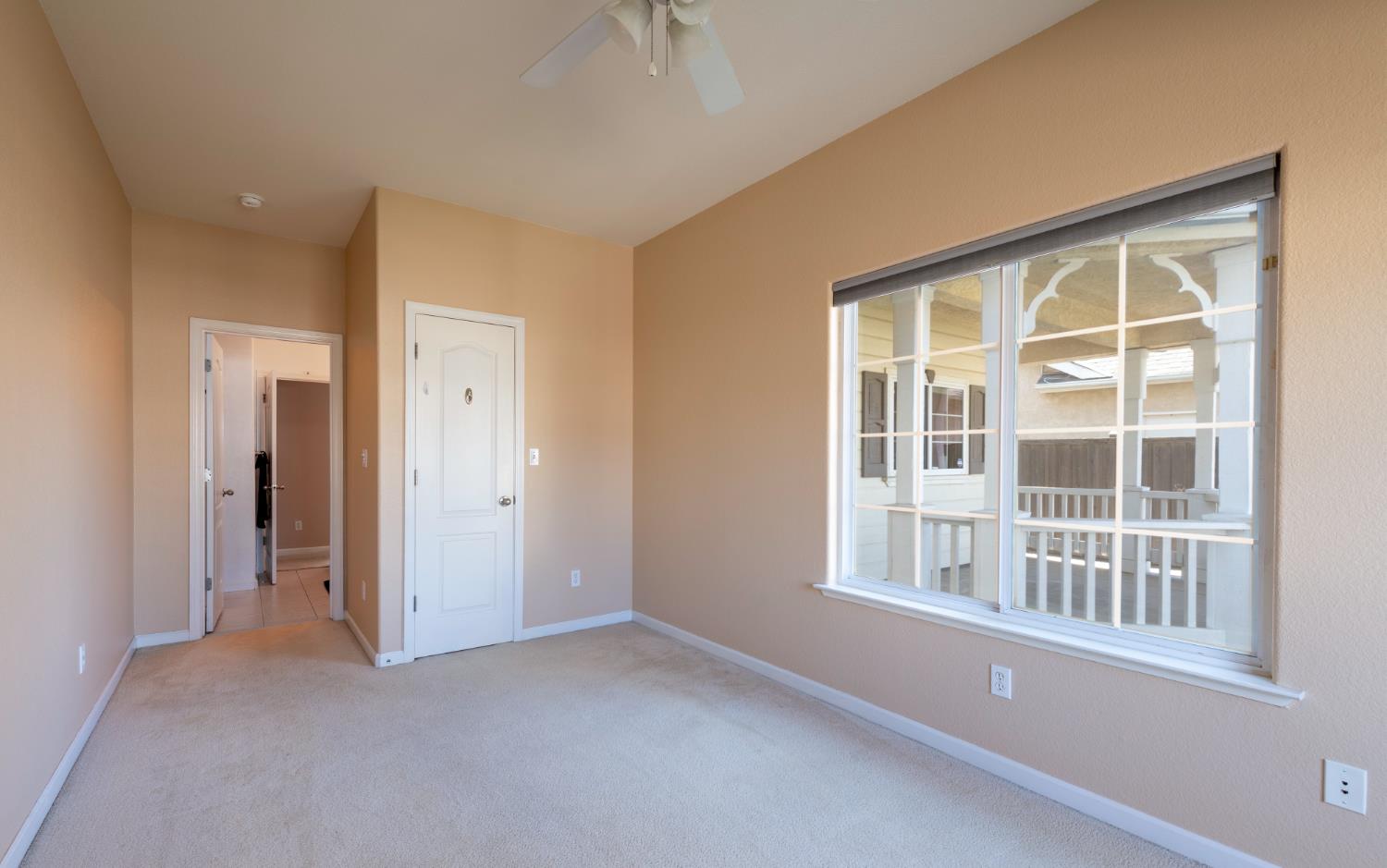 6525 East Raco Avenue Fresno, CA 93727 - Photo 11 of 27 a view of empty room with windows