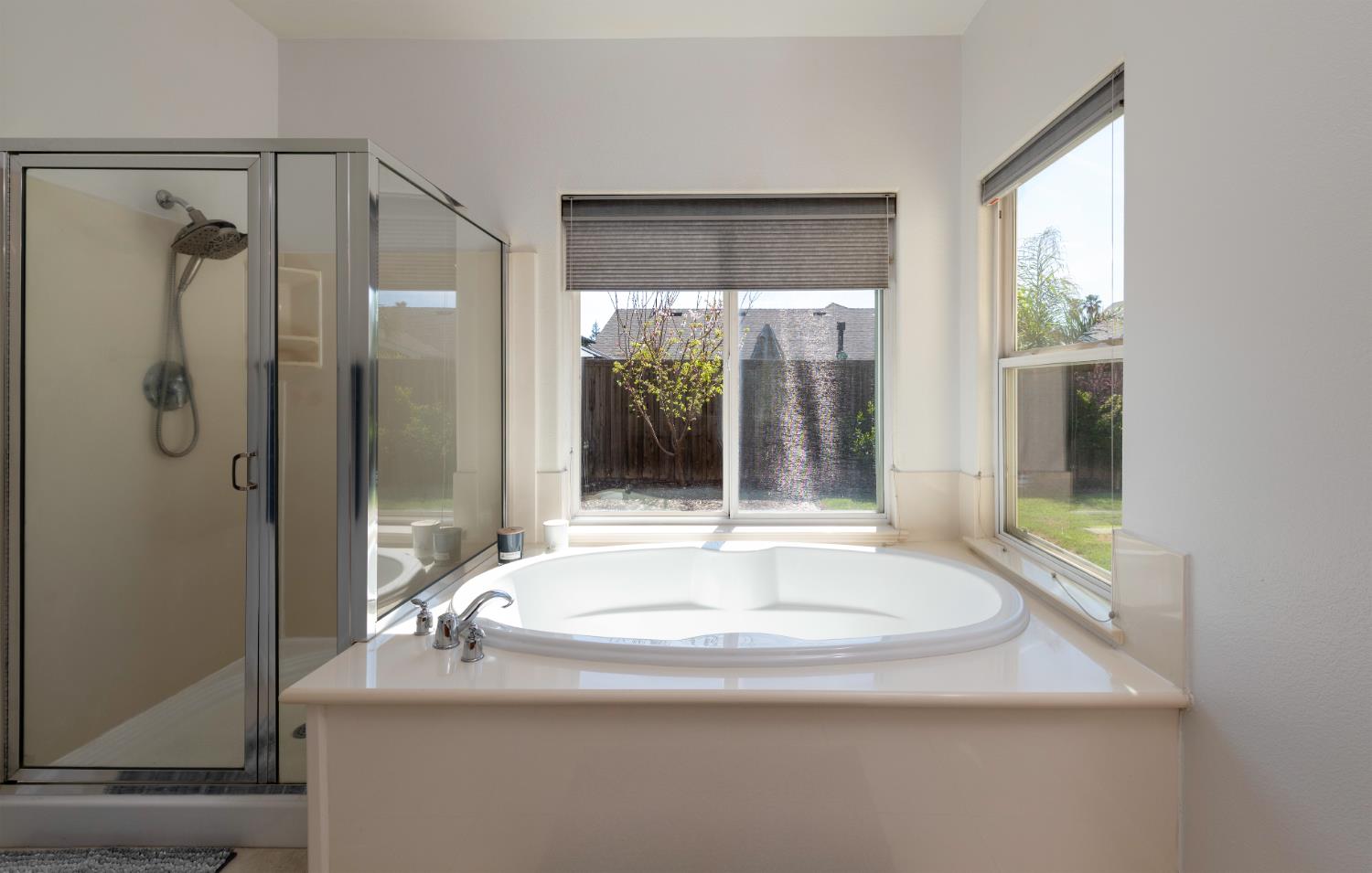6525 East Raco Avenue Fresno, CA 93727 - Photo 20 of 27 a bathroom with a sink and shower