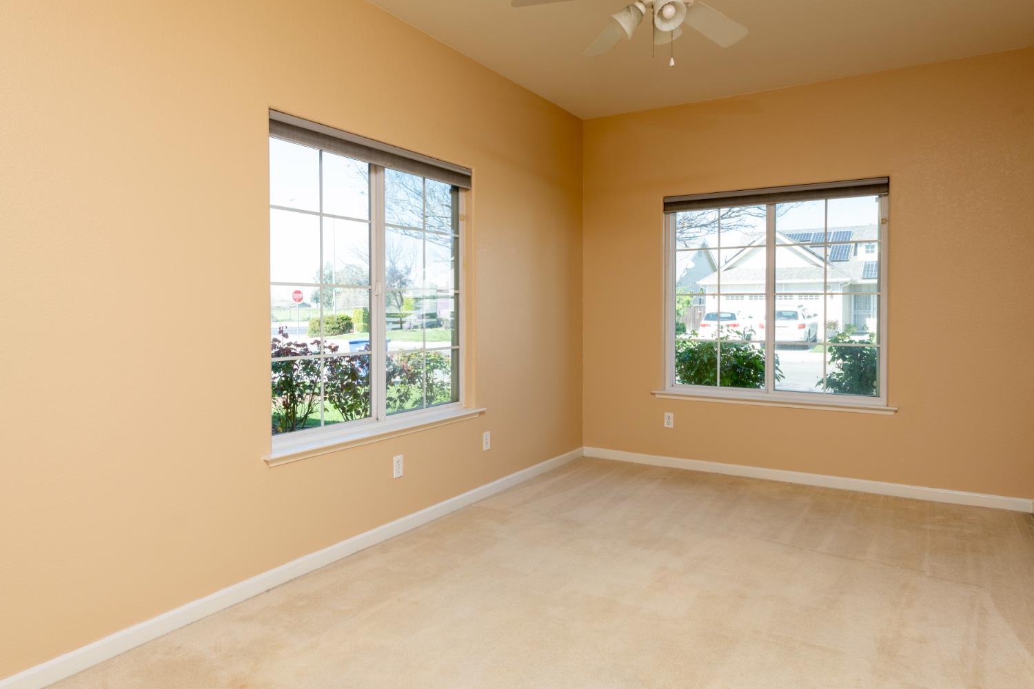 6525 East Raco Avenue Fresno, CA 93727 - Photo 10 of 27 a view of an empty room with a window