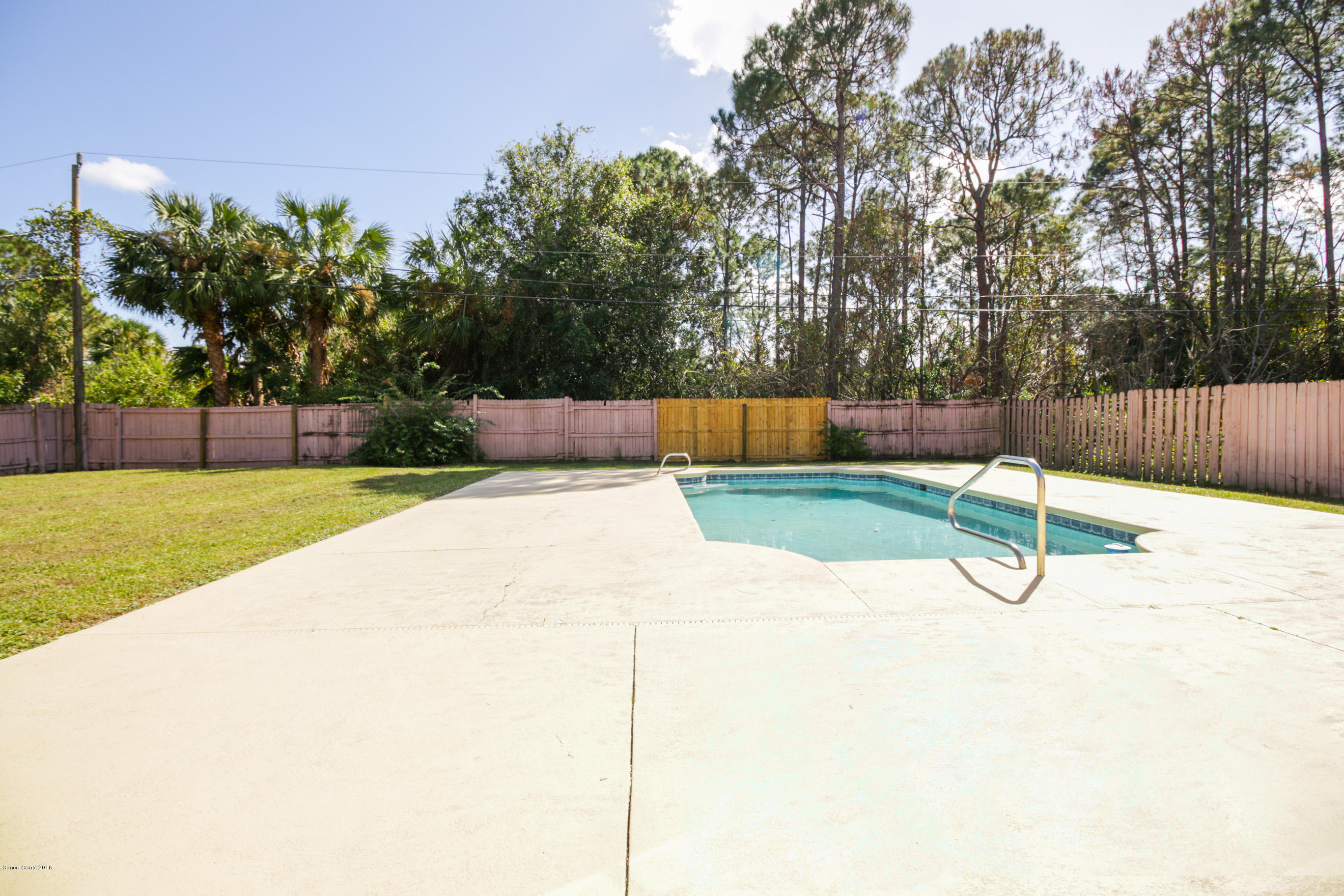 441 Wildmer Road Southwest Palm Bay, FL 32908 - Photo 62 of 67 a view of a park with a slide