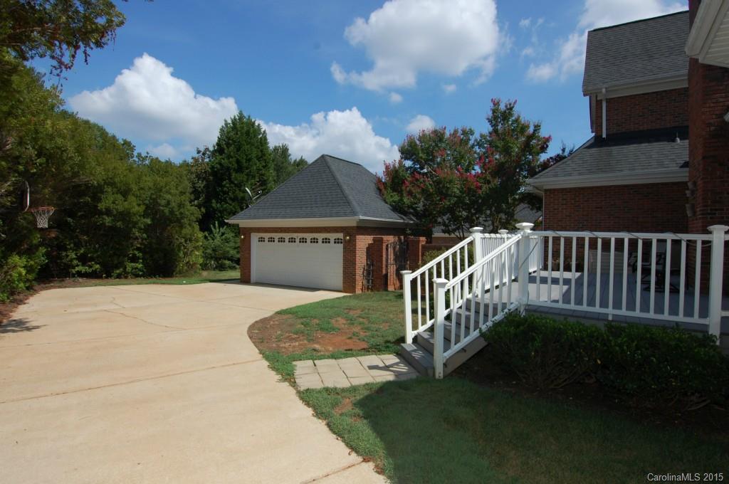 425 St Michaels Way Fort Mill, SC 29708 - Photo 20 of 21 a balcony with wooden floor and fence