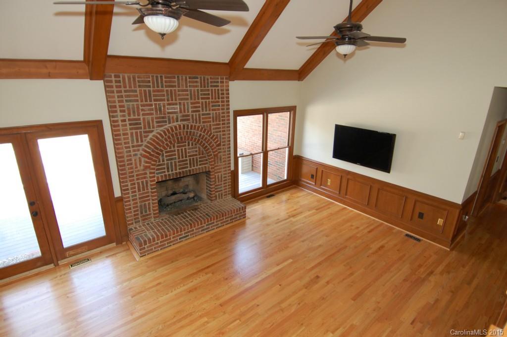 425 St Michaels Way Fort Mill, SC 29708 - Photo 8 of 21 a living room with furniture and a flat screen tv