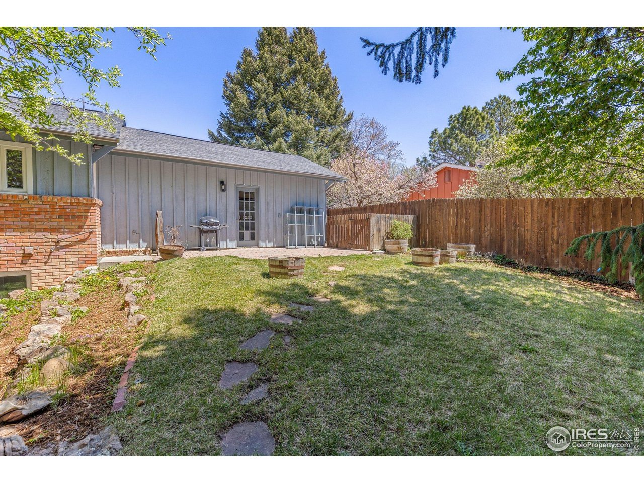 27 Cornell Drive Longmont, CO 80503 - Photo 28 of 33 a house view with a outdoor space
