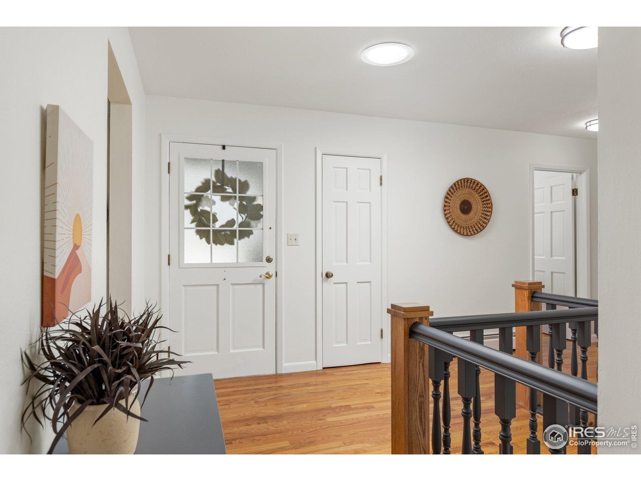 27 Cornell Drive Longmont, CO 80503 - Photo 6 of 33 a view of a hallway with front door