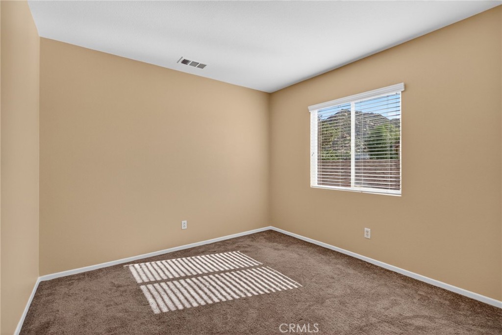 3958 Barbury Palms Way Perris, CA 92571 - Photo 25 of 35 a view of a room with a window