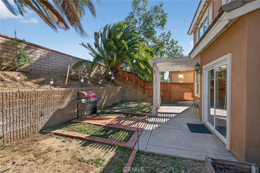 3958 Barbury Palms Way Perris, CA 92571 - Photo 30 of 35 a view of yard with patio