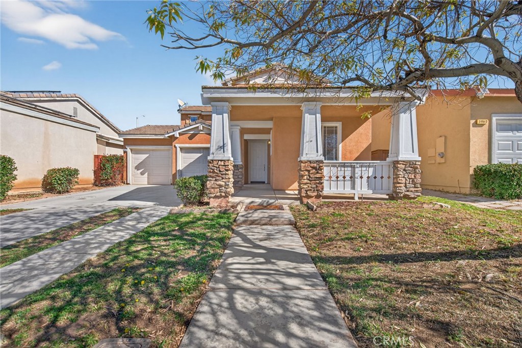 3958 Barbury Palms Way Perris, CA 92571 - Photo 35 of 35 a front view of a house with a yard