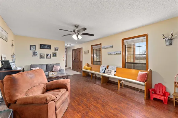 a kitchen with stainless steel appliances and refrigerator