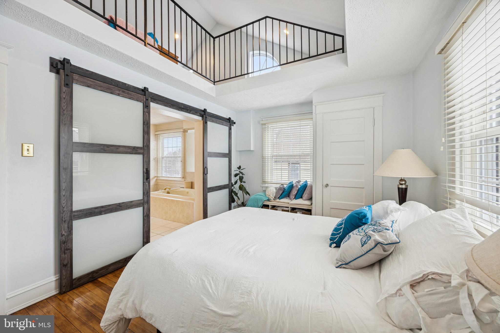 120 West Springfield Road Springfield, PA 19064 - Photo 23 of 35 a bedroom with a bed and a window