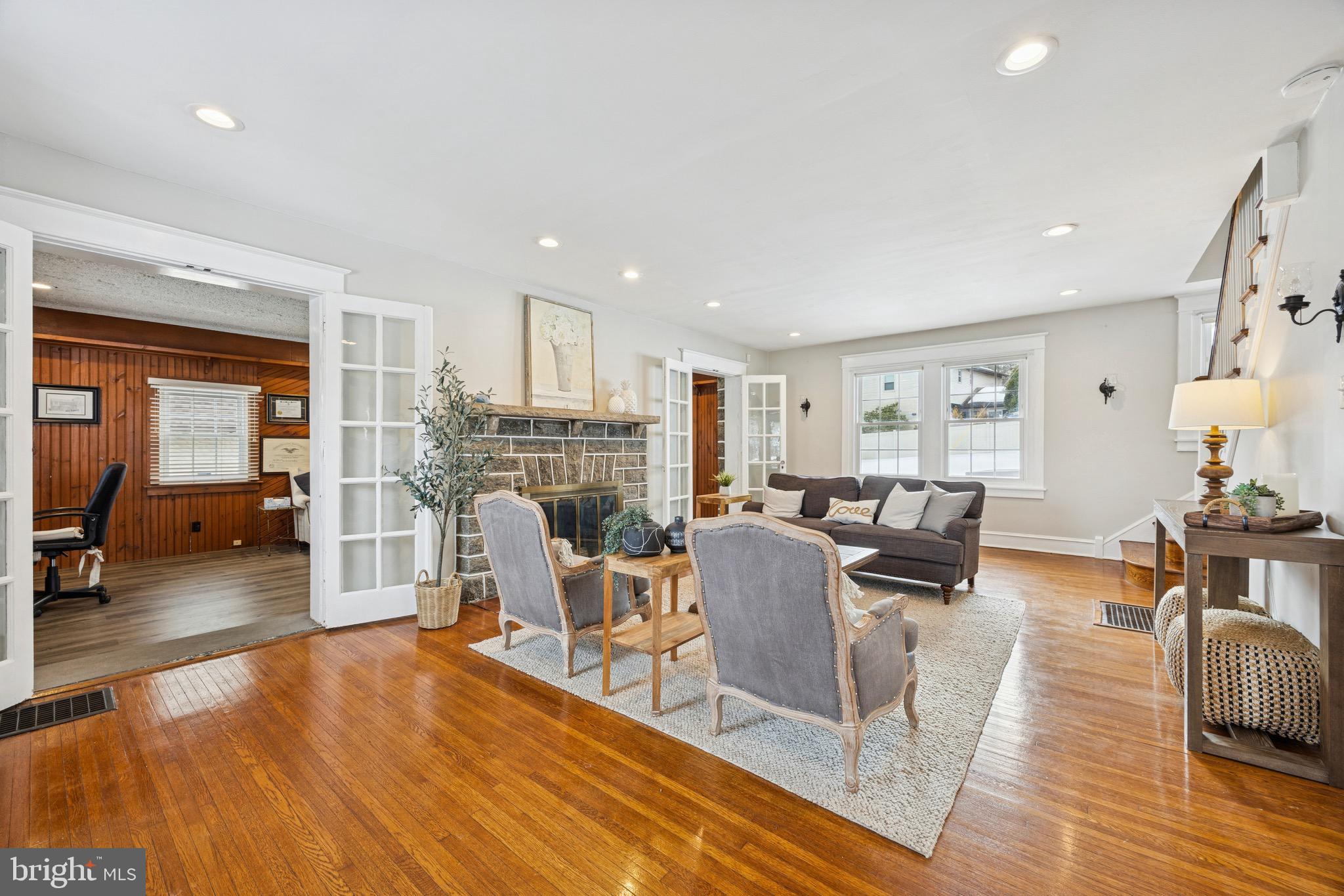 120 West Springfield Road Springfield, PA 19064 - Photo 3 of 35 a living room with furniture and a wooden floor