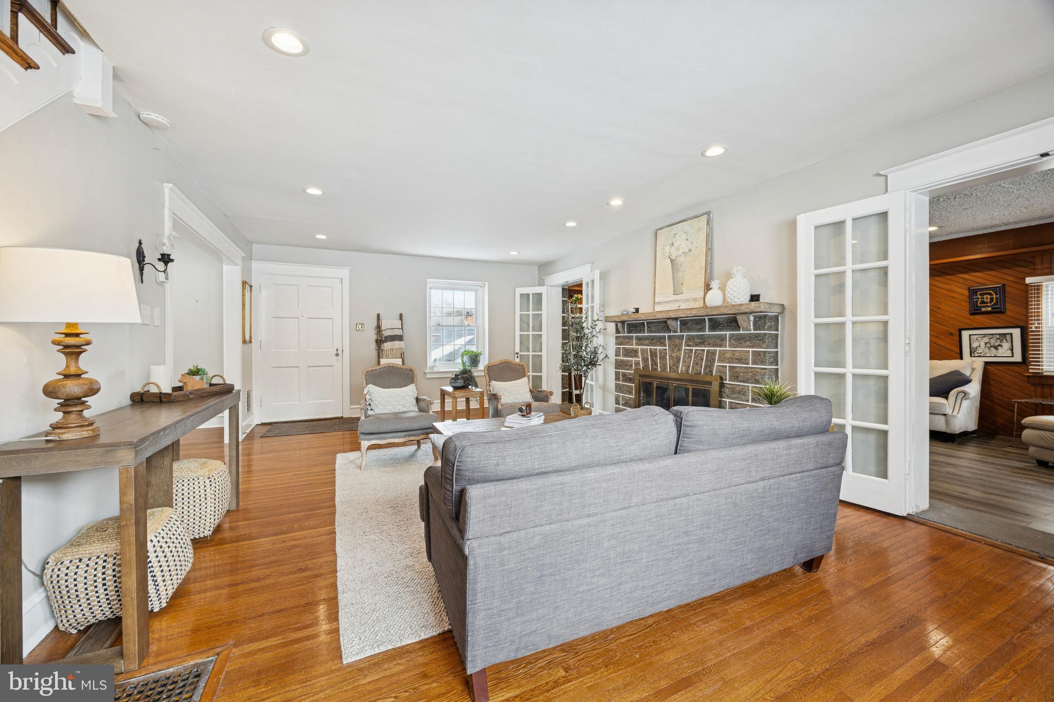 120 West Springfield Road Springfield, PA 19064 - Photo 5 of 35 a living room with furniture and a wooden floor