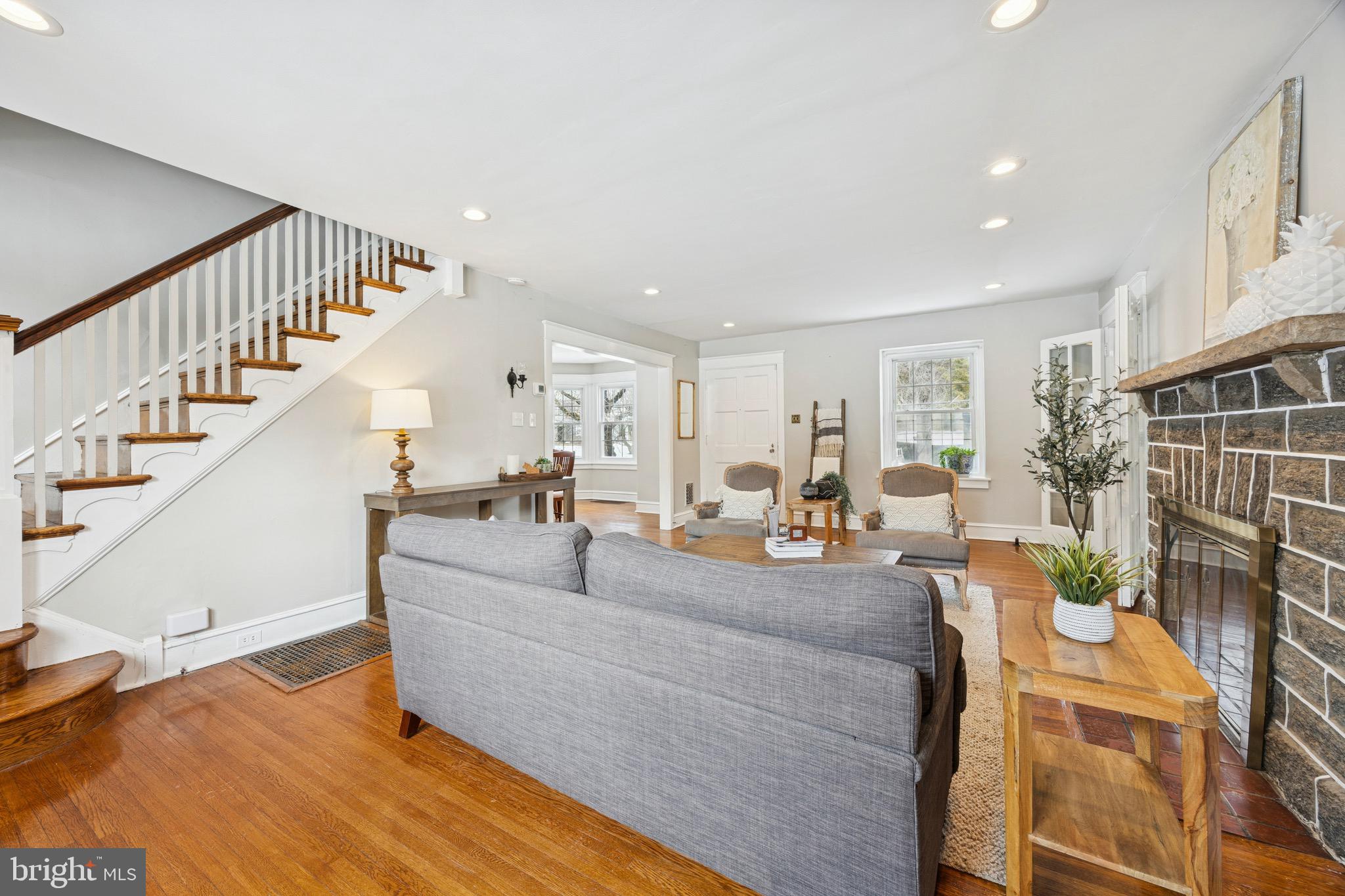 120 West Springfield Road Springfield, PA 19064 - Photo 6 of 35 a living room with furniture and a table