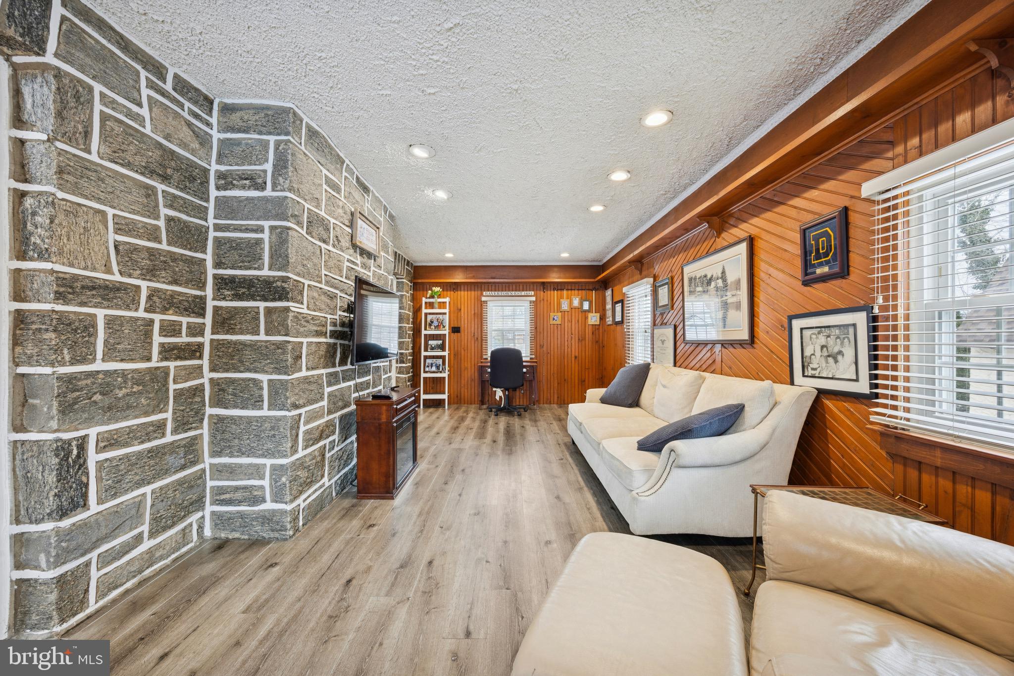 120 West Springfield Road Springfield, PA 19064 - Photo 7 of 35 a living room with furniture and a wooden floor