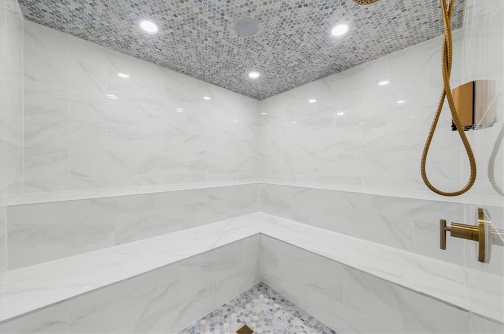 494 River Overlook Road Dawsonville, GA 30534 - Photo 67 of 96 a bathroom with a bathtub and a shower