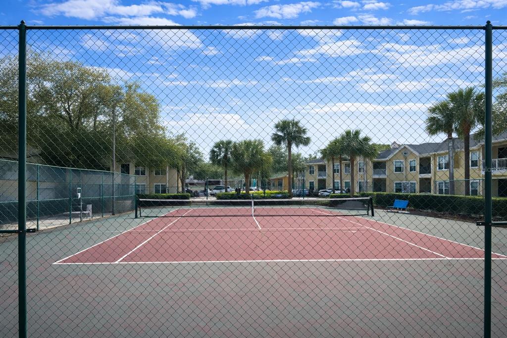 1049 South Hiawassee Road, Unit 3422 Orlando, FL 32835 - Photo 11 of 14 a tennis court view