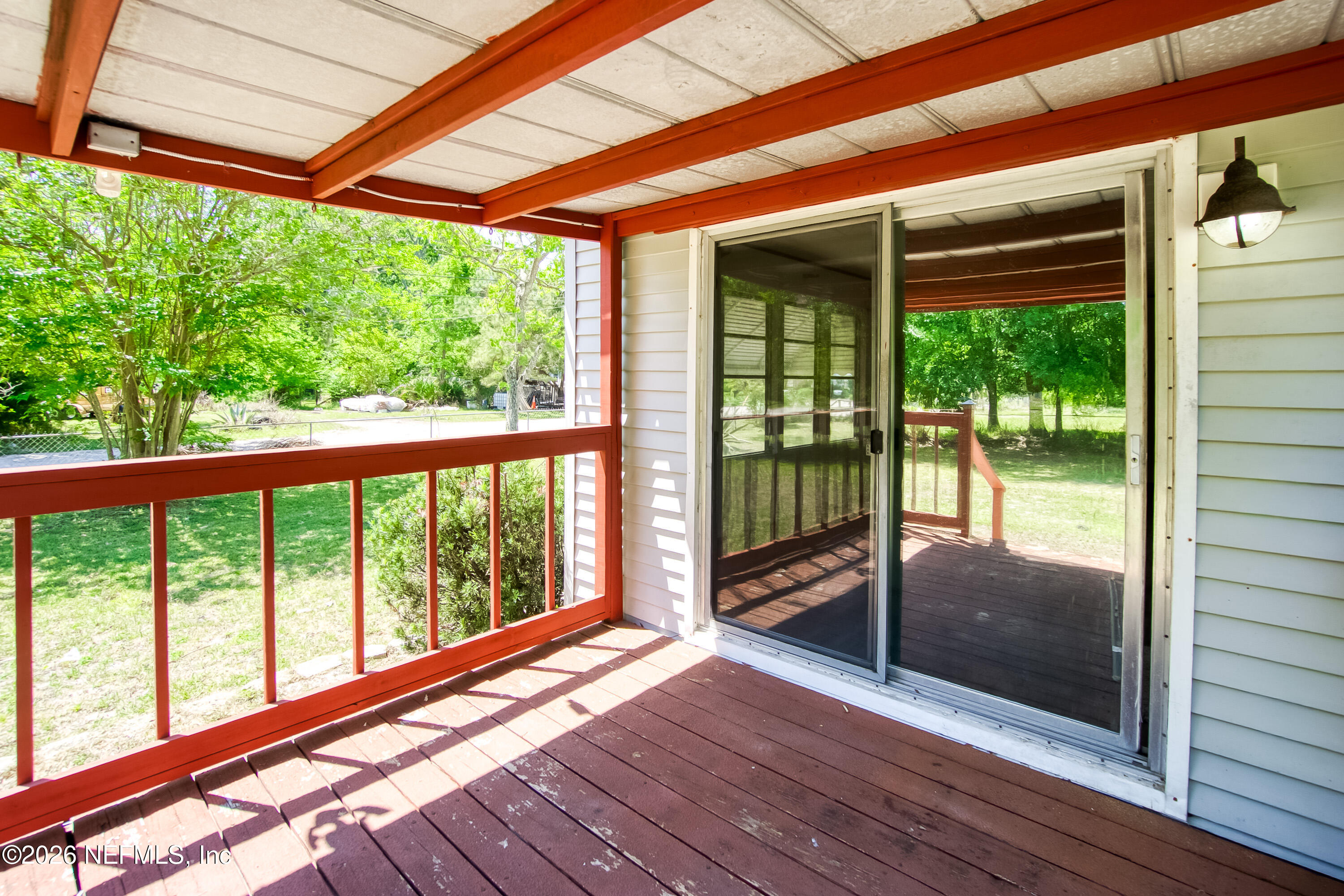 13727 Chauny Road Jacksonville, FL 32224 - Photo 12 of 42 13727ChaunyRdExteriorPorchAngle2