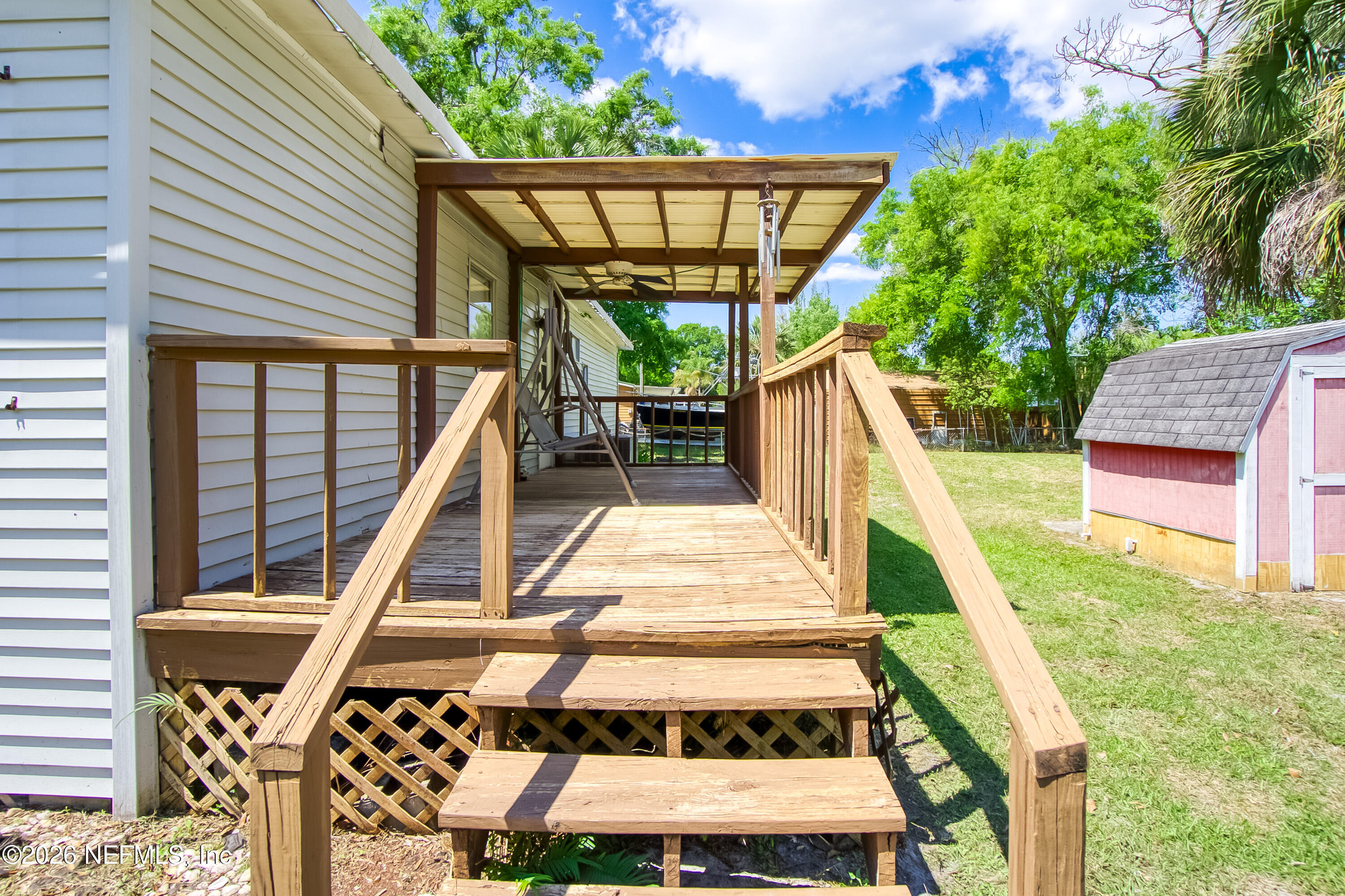 13727 Chauny Road Jacksonville, FL 32224 - Photo 14 of 42 13727ChaunyRdExteriorPorchAngle4