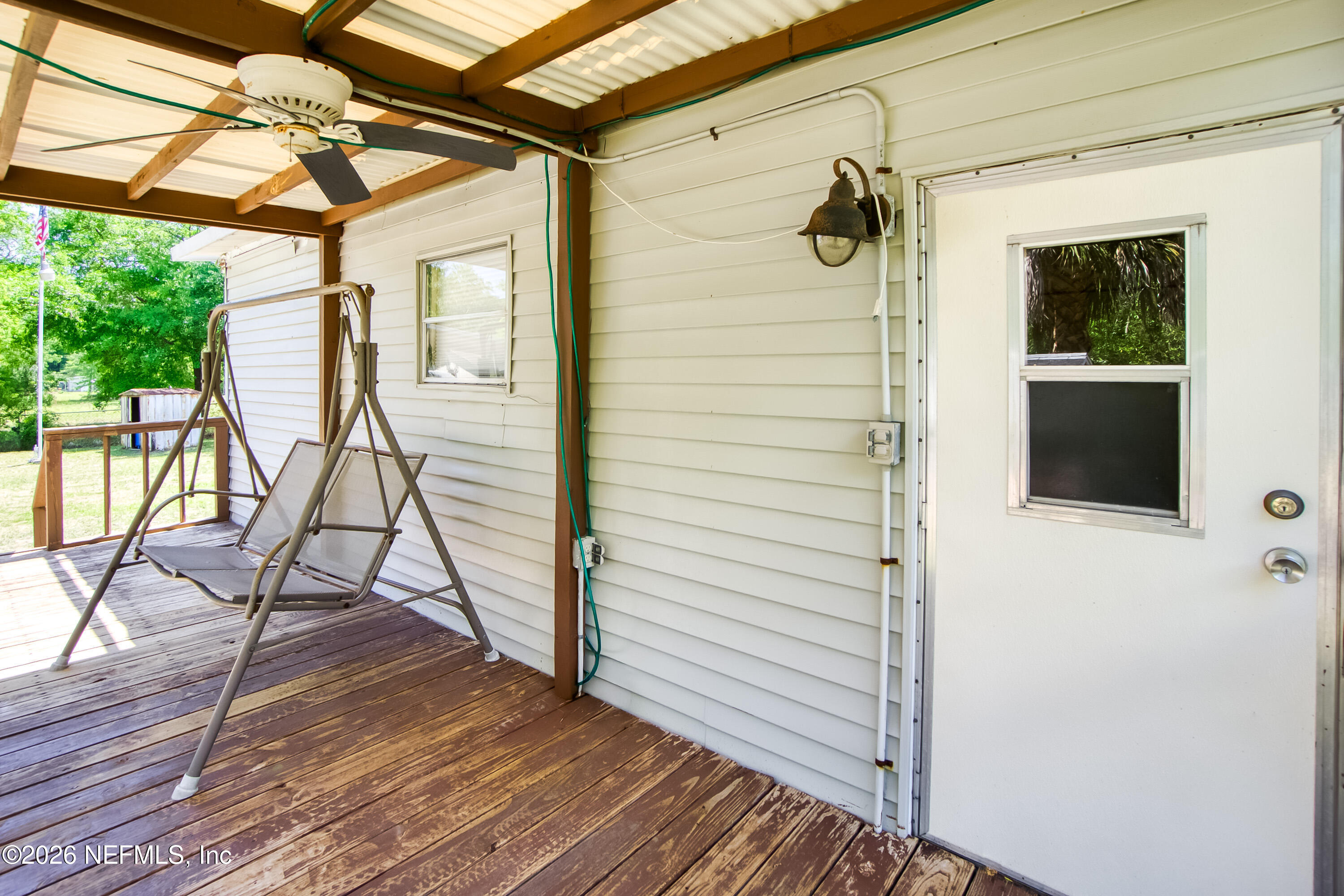 13727 Chauny Road Jacksonville, FL 32224 - Photo 16 of 42 13727ChaunyRdExteriorPorchAngle6