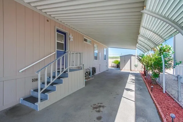 a view of a porch with furniture