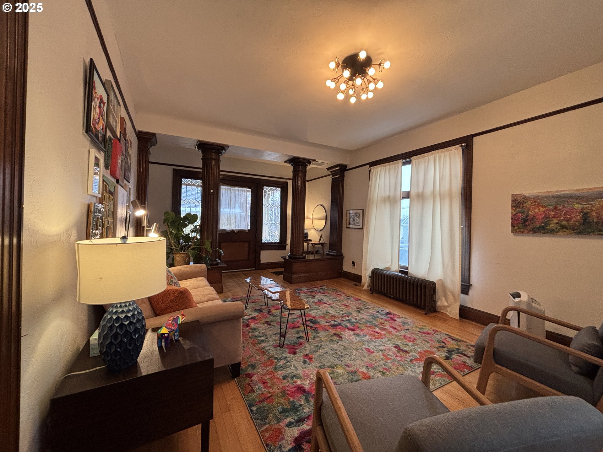 314 Northwest 4th Street Pendleton, OR 97801 - Photo 4 of 7 a living room with furniture and a large window