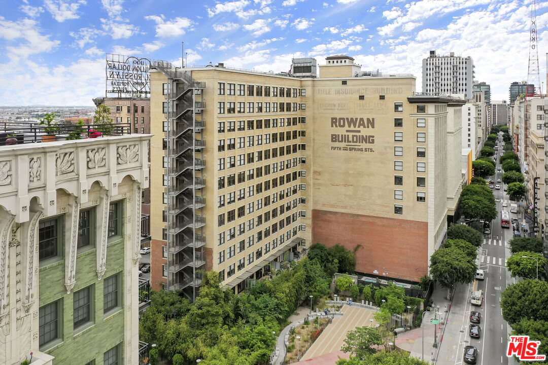 460 South Spring Street, Unit 701 Los Angeles, CA 90013 - Photo 32 of 32 a view of a city with tall buildings