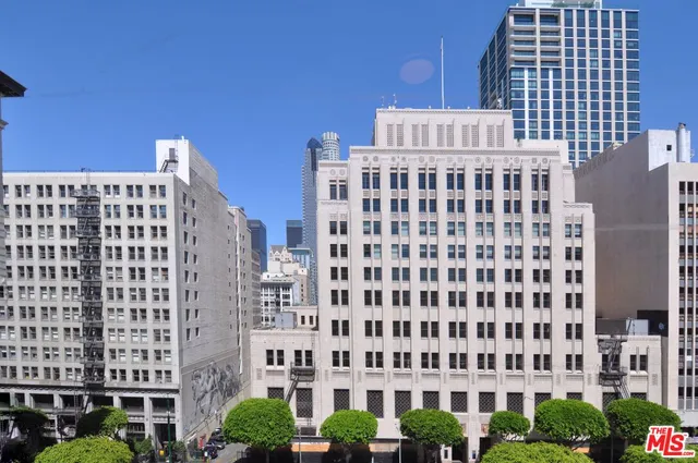 a view of a building with a street