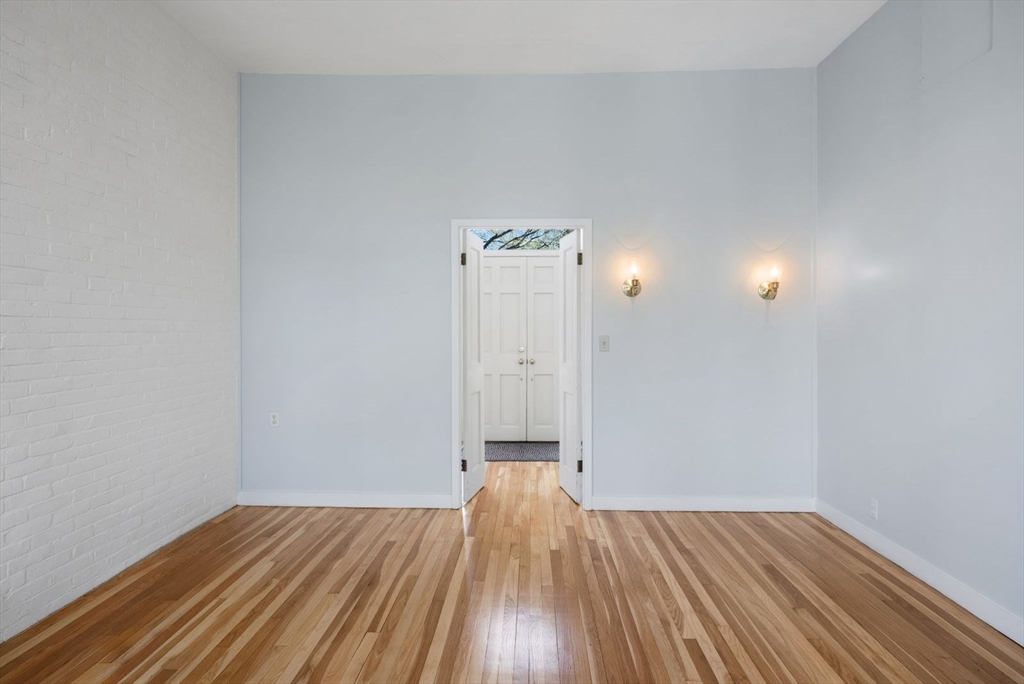3 Proctor Street Manchester, MA 01944 - Photo 13 of 40 a view of an empty room with wooden floor