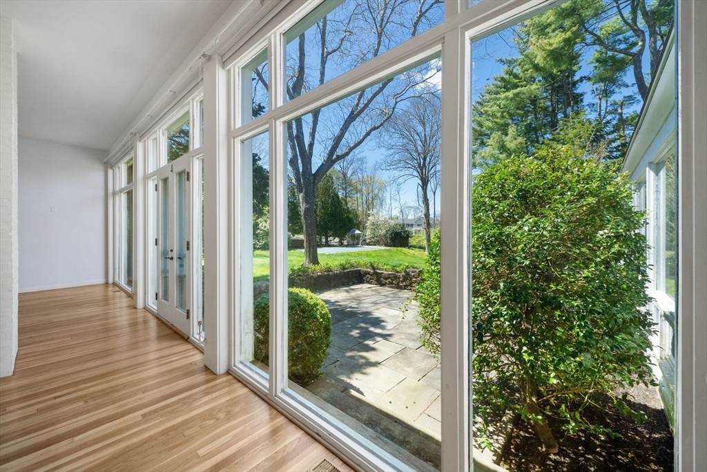 3 Proctor Street Manchester, MA 01944 - Photo 16 of 40 a view of a porch with wooden floor and outdoor space