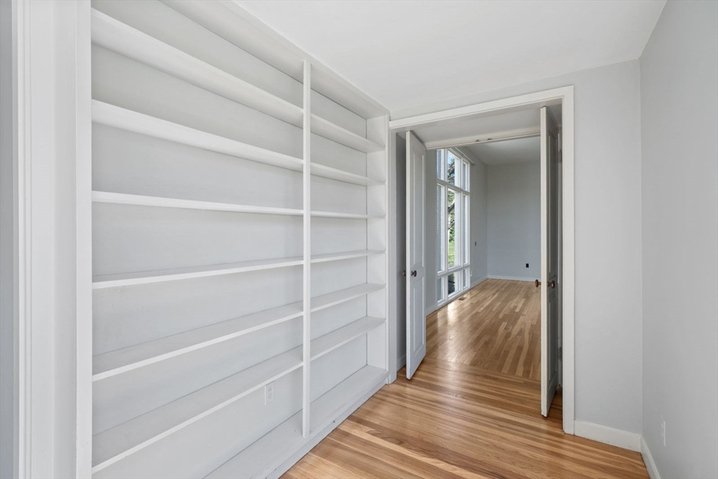 3 Proctor Street Manchester, MA 01944 - Photo 24 of 40 a view of a hallway with wooden floor and closet