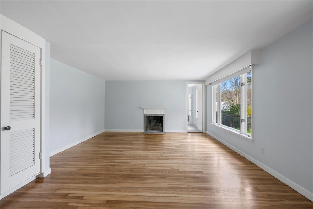 3 Proctor Street Manchester, MA 01944 - Photo 29 of 40 a view of a livingroom with wooden floor and a window