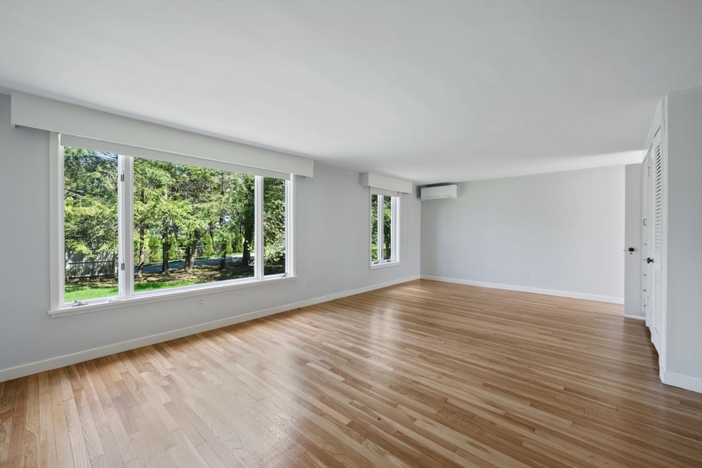 3 Proctor Street Manchester, MA 01944 - Photo 31 of 40 a view of an empty room with wooden floor and a window
