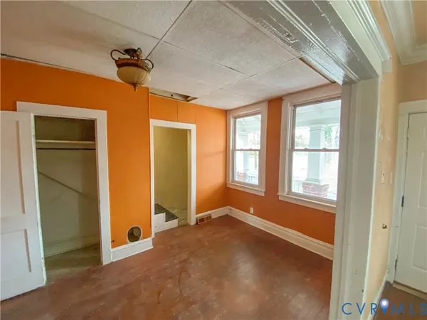 a view of a hallway with a yellow space