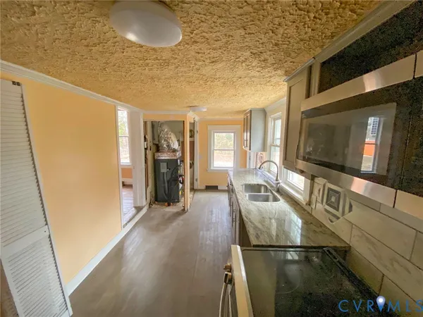 a hallway with a sink
