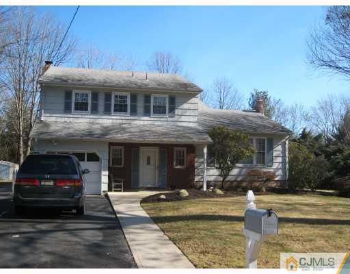 6 Sherwood Road Edison, NJ 08820 - Photo 1 of 10 a front view of a house with a garden