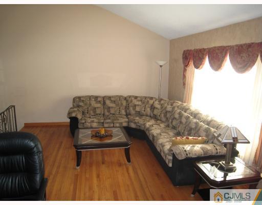 6 Sherwood Road Edison, NJ 08820 - Photo 4 of 10 a living room with furniture
