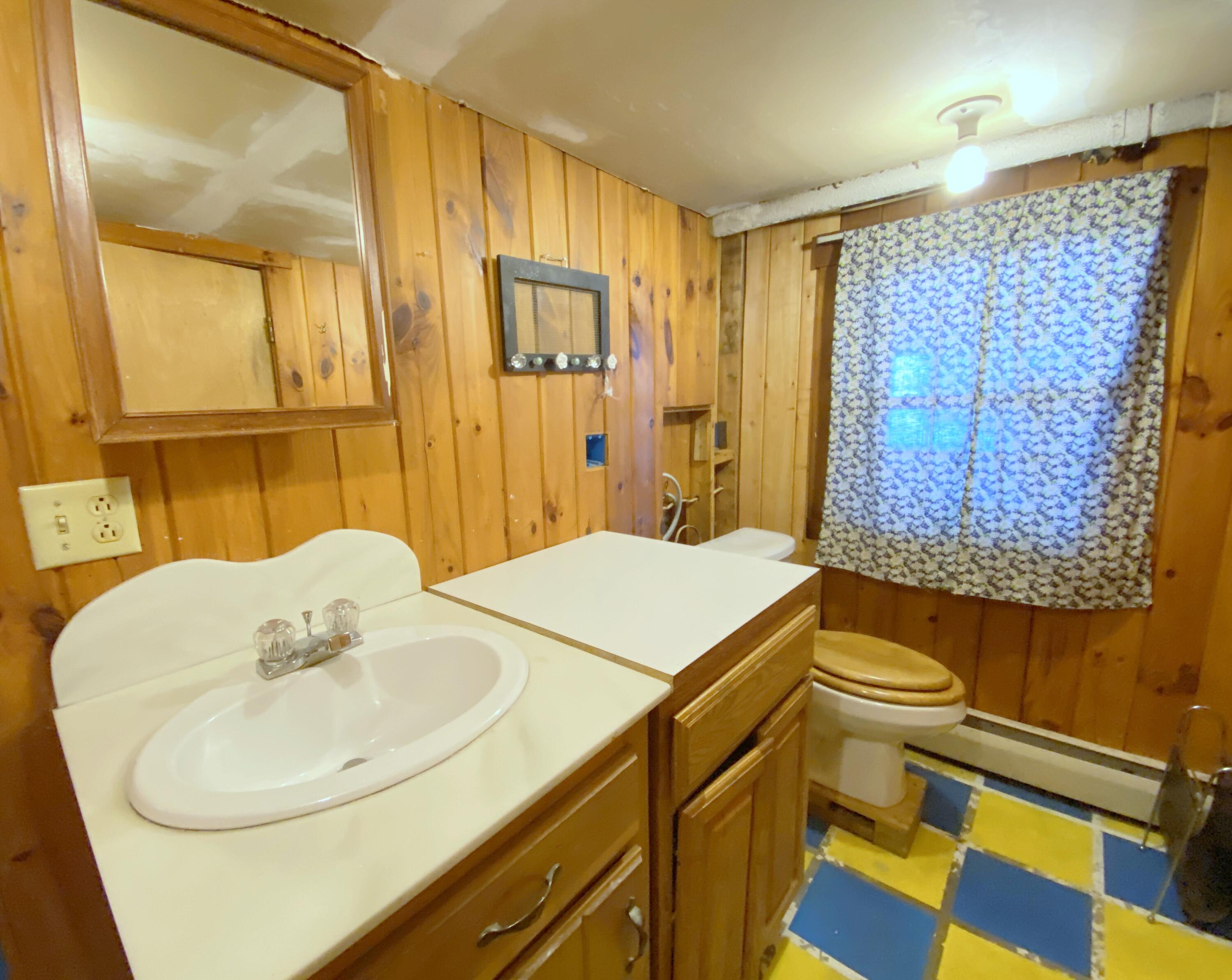19 Wells Highlands Wells, ME 04090 - Photo 25 of 25 Lower level half bath and Laundry